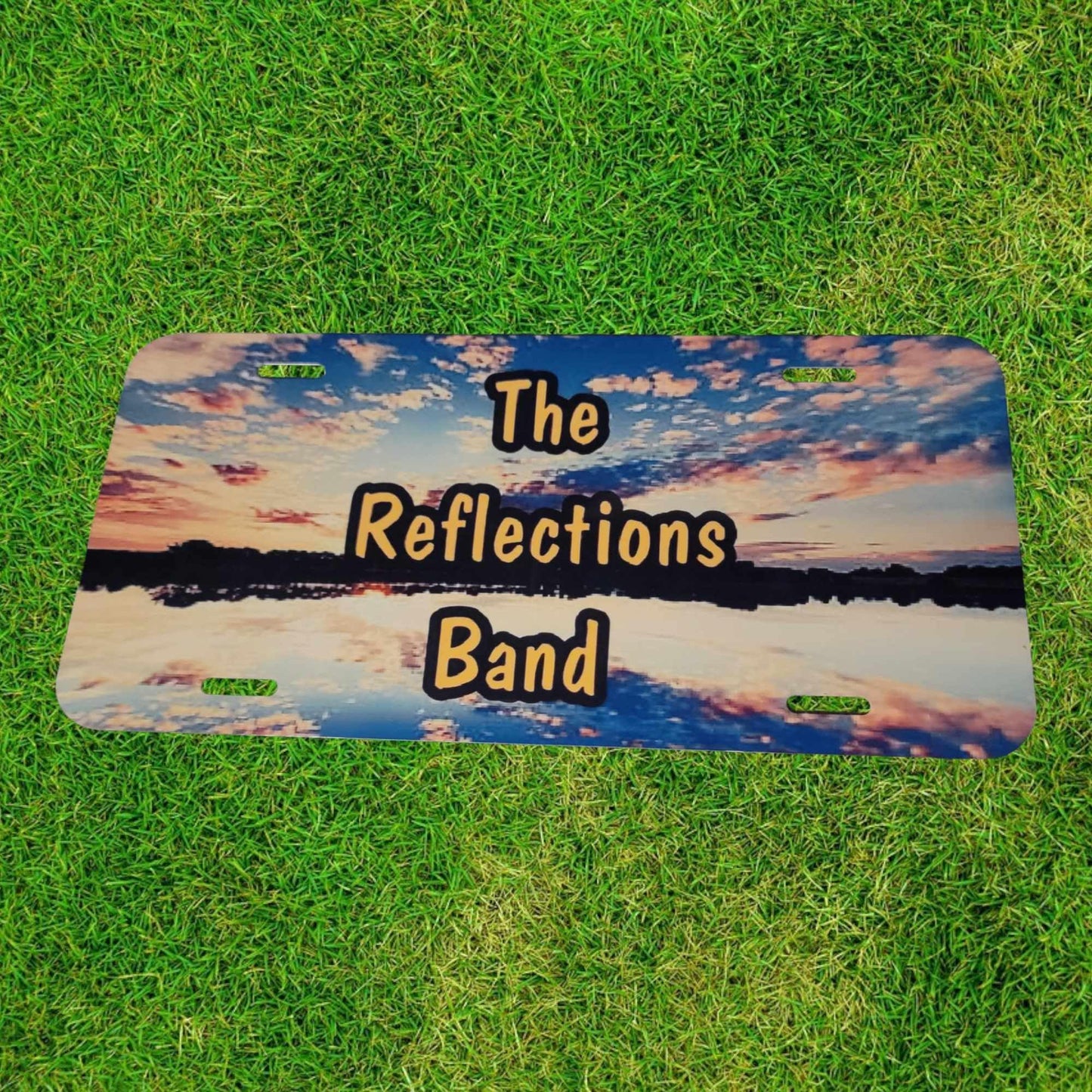 Reflections Band Front License Plate